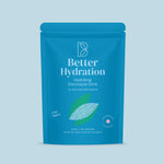A blue stand-up pouch of Better Hydration Hydrating Electrolyte Drink on a light blue background. The packaging features white text and a green leaf graphic.